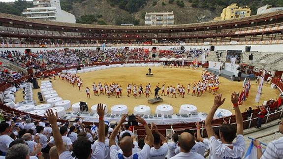 The parade of the athletes from the competing nations in the Malagueta bullring.