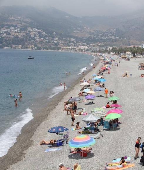 Sunbathers on La Herradura beach. 