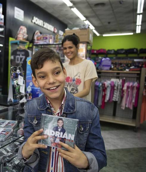 An archive image of Adrián Martín with his first CD.