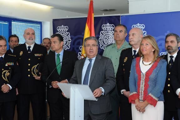 Interior minister Zoido, centre, making his statement in Marbella on Monday.