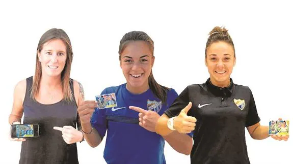 Malaga players Adriana, Ruth and Chelsea pose with their stickers.
