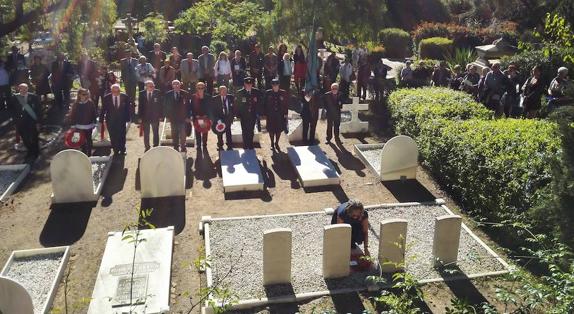 British consul Charmaine Arbouin lays a wreath on the war graves in the English cemetery, Malaga.