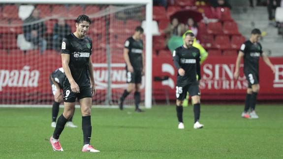 The players after conceding in stoppage time.