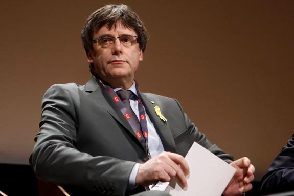 Catalunya's ex president Carles Puigdemont attended a debate on autonomy in Geneva in March. 