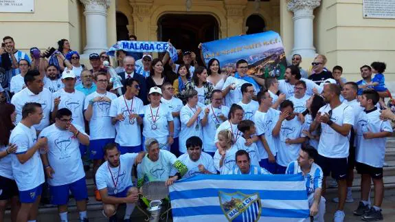 The squad on the steps of the city hall last week.