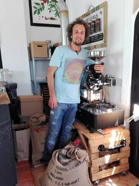 Radu with his coffee-roasting machine. 