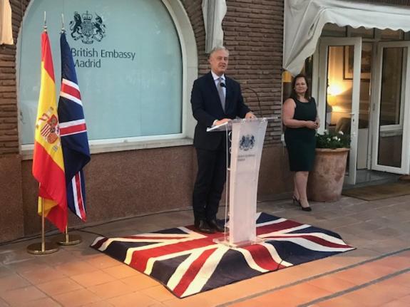 Simon Manley and his wife, during his speech to guests at his residence last week. 