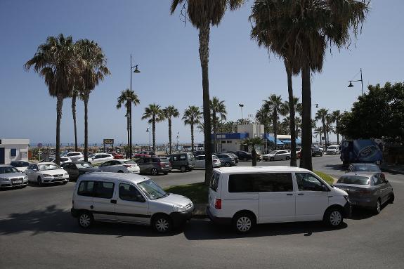 Cars on a roundabout in Playamar,  Torremolinos.