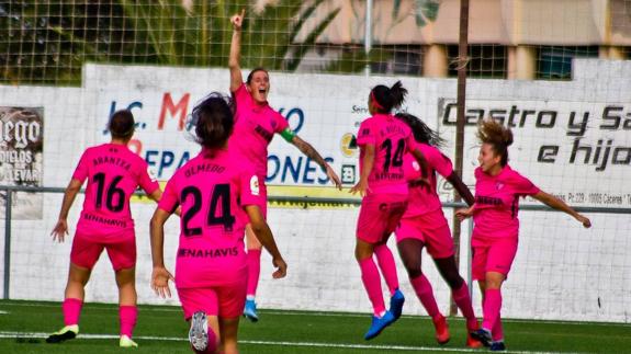 The players celebrate Saturday's winning goal.