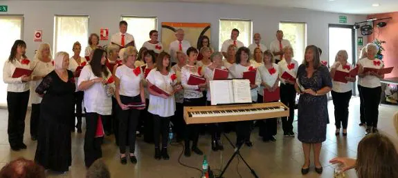 Shirley (front row, first left) and the Love to Sing choir.