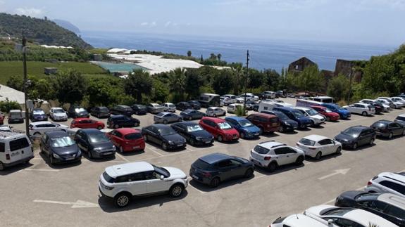 The car park for Maro beach users last summer.