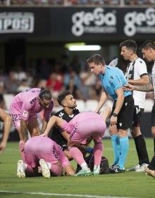 Imagen secundaria 2 - Imágenes del encuentro de esta tarde en Cartagonova. 