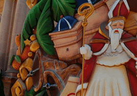 La leyenda de San Nicolás y murales de la ofrenda de flores en la Concatedral.