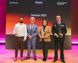 El presidente de la DOP José Juan Reus, junto a los premiados.