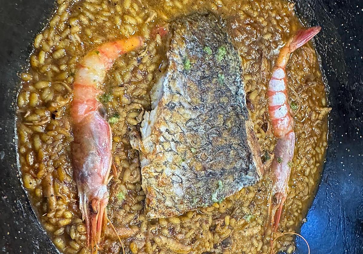 Arroz meloso de corvina y gambas.
