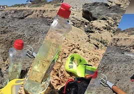 Una botella de lejía utilizada por el denunciado.