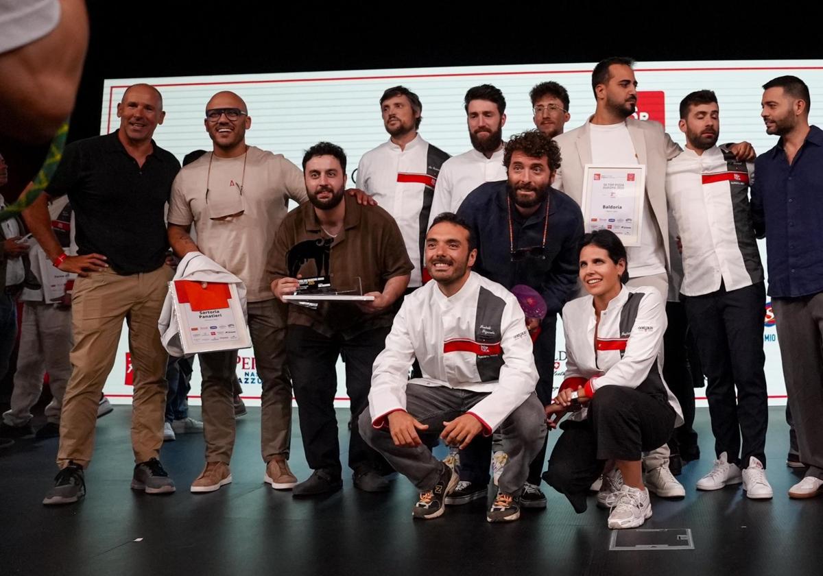 The owners, Raquel Perramón and Gonzalo Infante, alongside other awardees.
