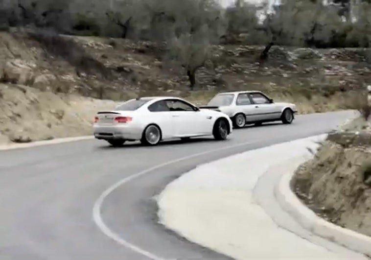 The cars, in the midst of reckless manoeuvres.