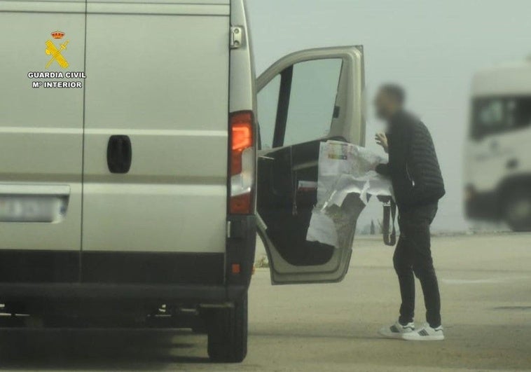 Image of the suspect during one of his illicit acts.