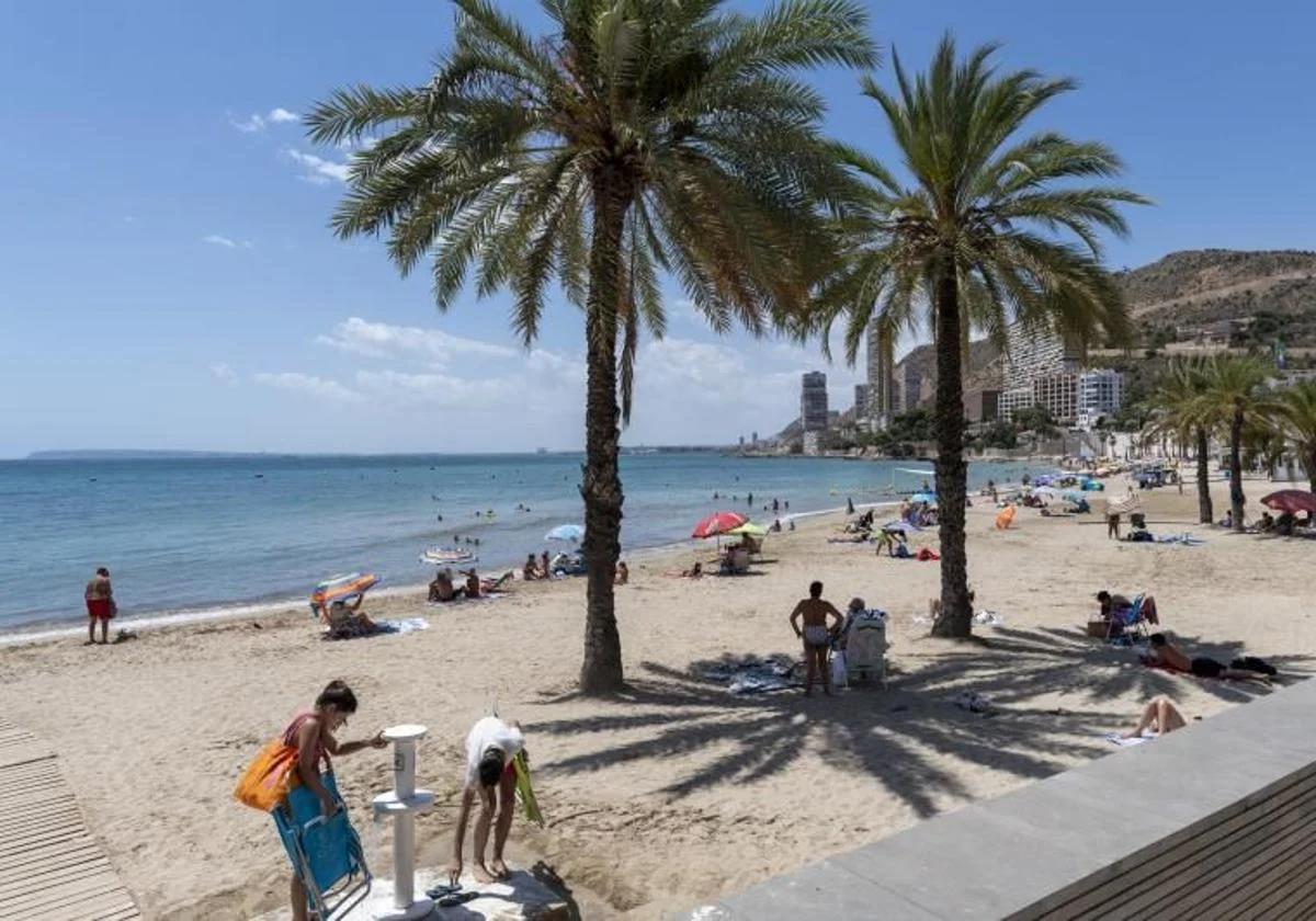 Bathers at Albufereta Beach.