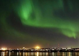Una aurora boreal en Reikiavik.